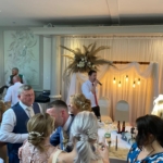surprise singing waiter at a wedding