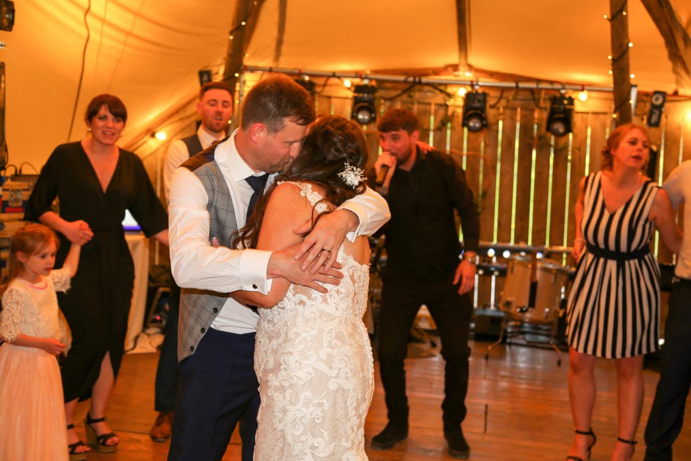 The Bride and Groom enjoying a dance as Silver Service Singers perform.
