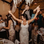singing waiter dancing with bride
