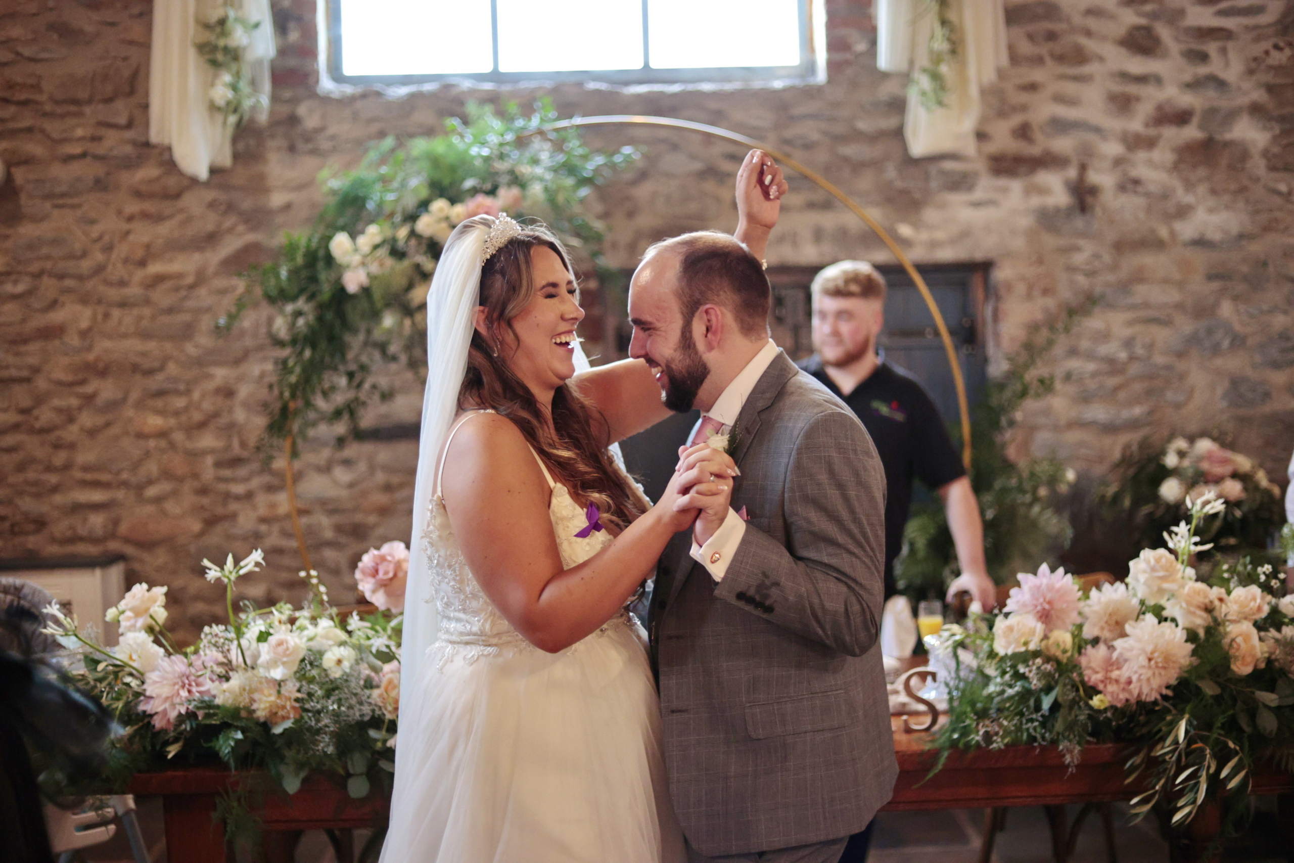 Newly weds dancing to Silver Service Singers singing waiters