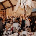 singing waiters wedding guests