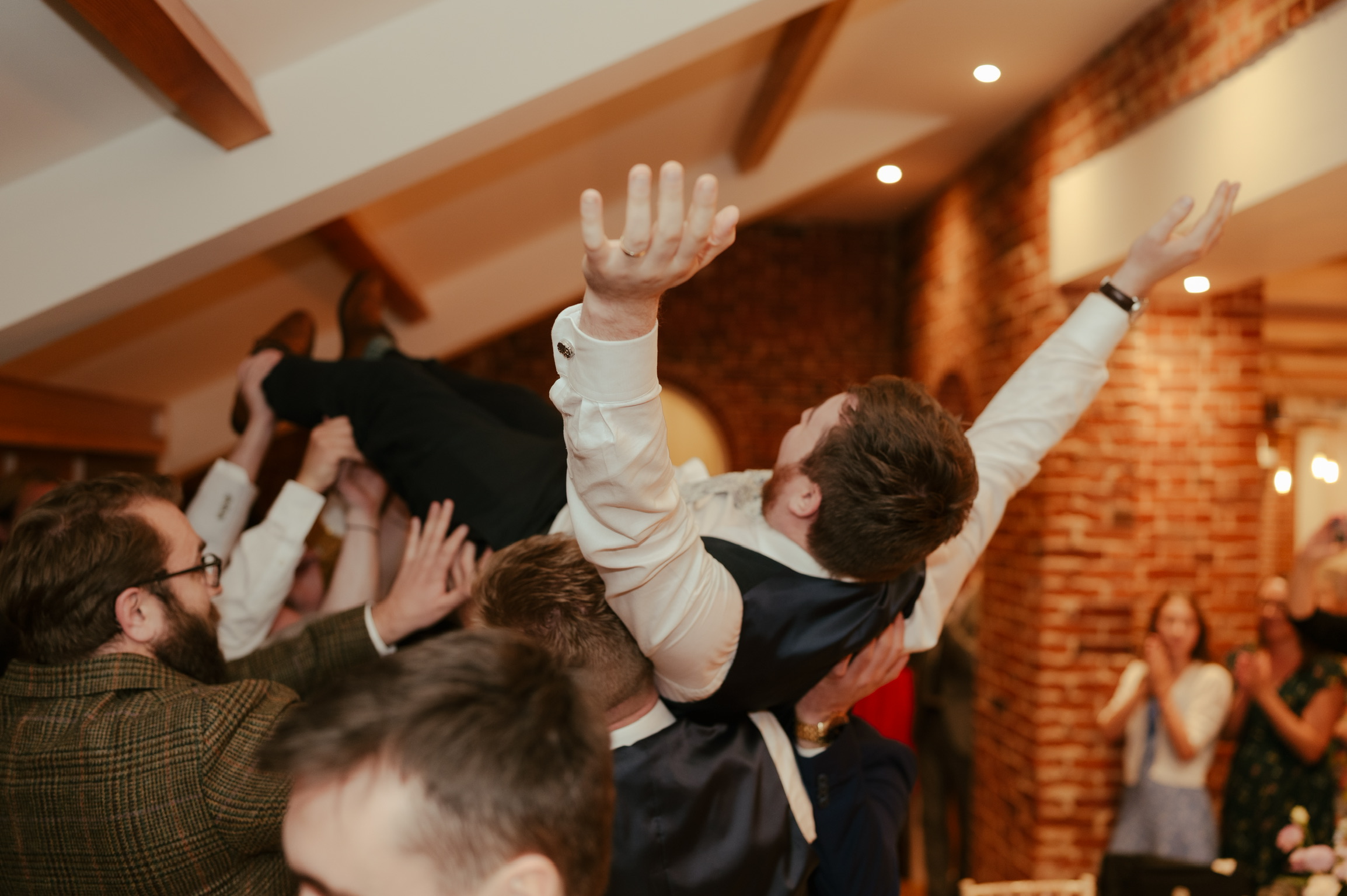 Our singing waiter crowd surfs at a wedding!