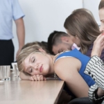 Attendees asleep at a corporate event