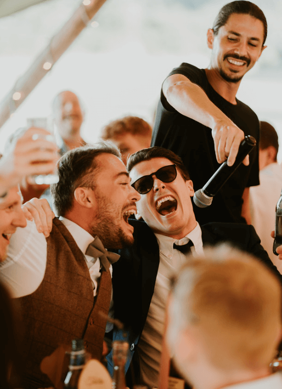 Groom sings along with Silver Service Singers