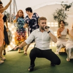 Silver Service Singing Waiter performs with bridesmaids and guests