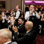 Two Singing Waiters performing at a dinner event - Silver Service Singing Waiters