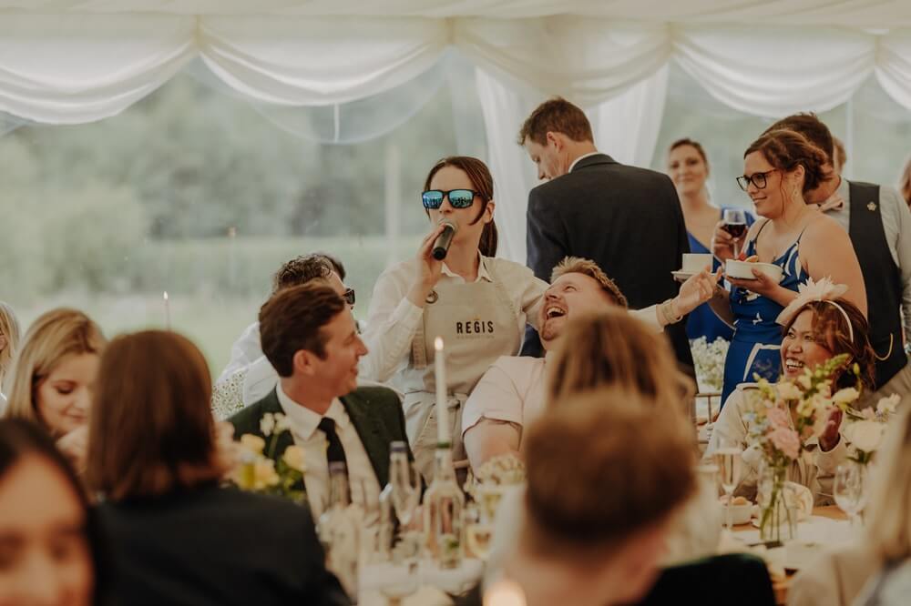 Silver Service Singing Waitress interacting with guests
