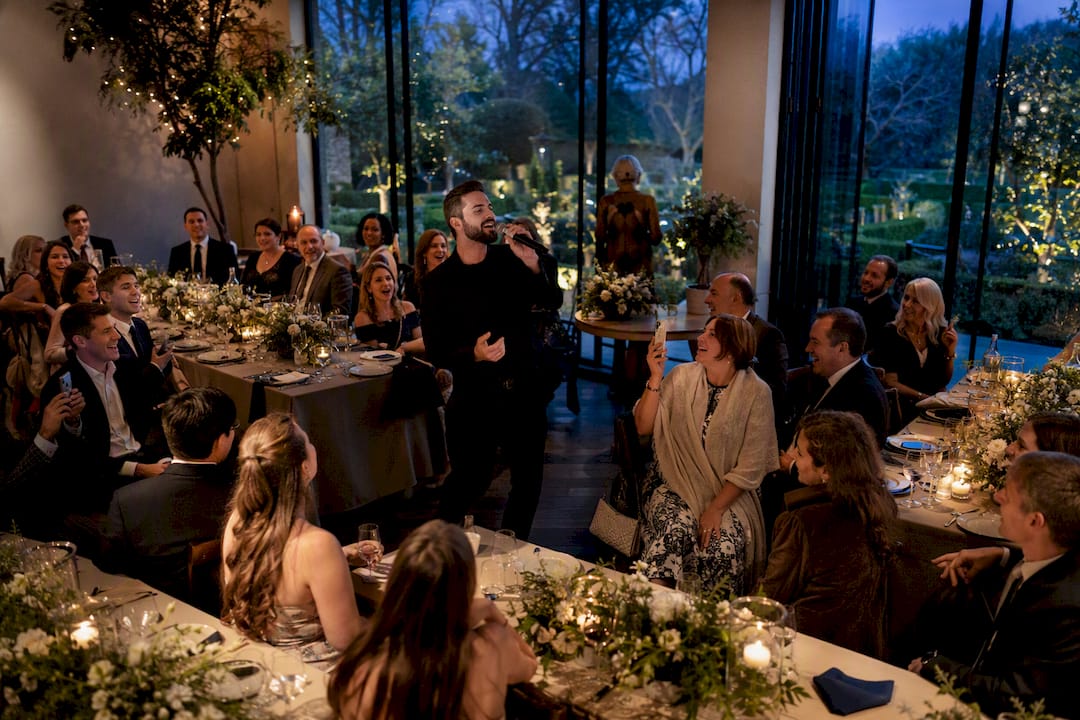 Small wedding guests joining a surprise song