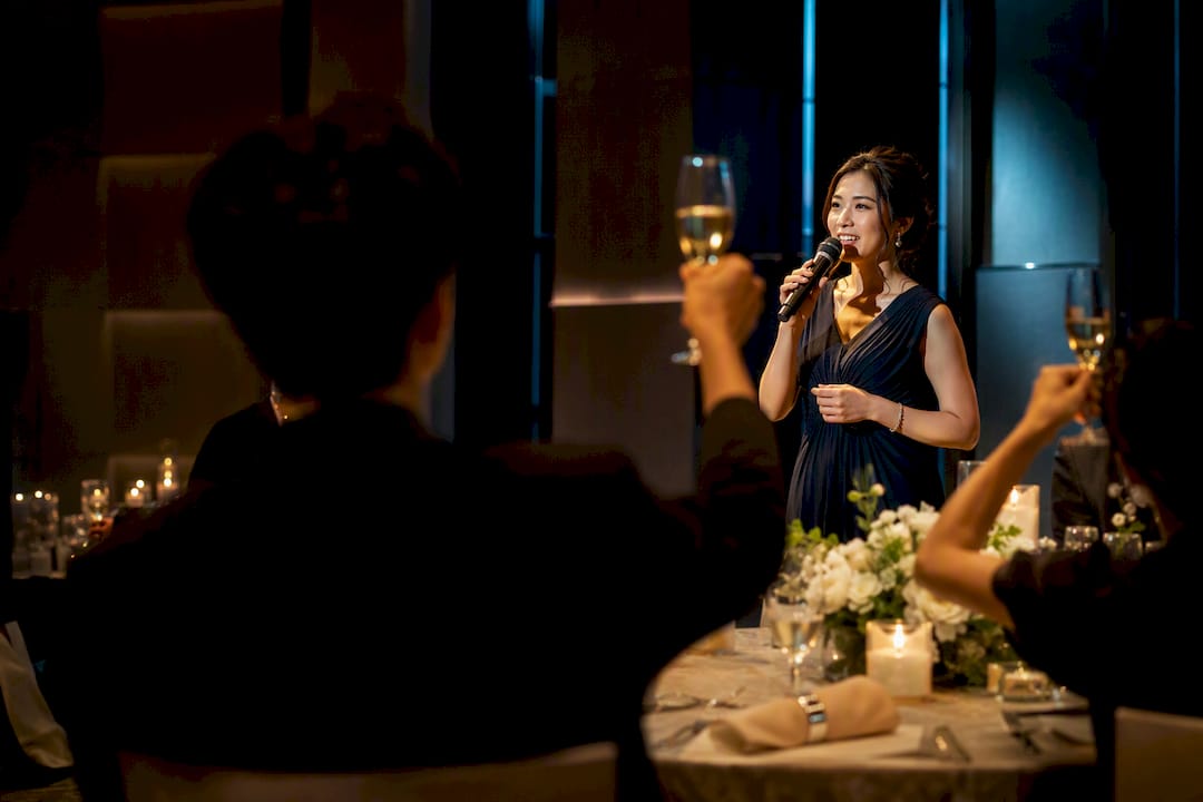 Singer delivering musical toast to guests