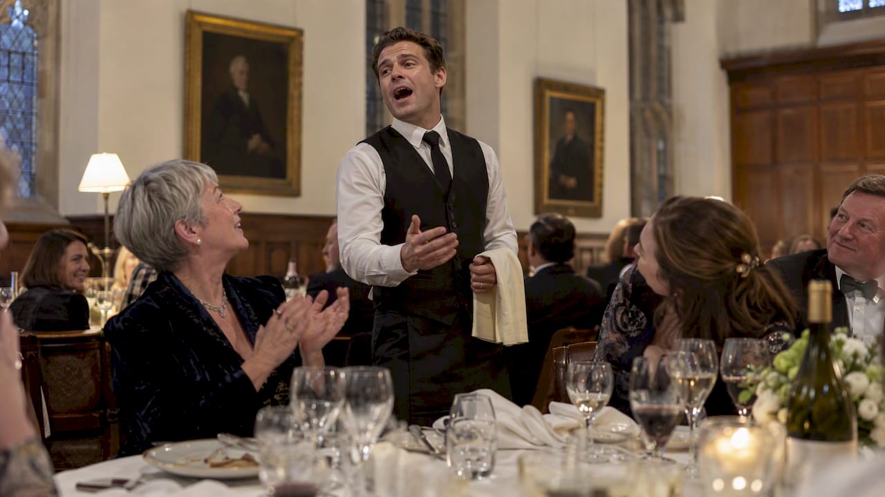 Singing waiter surprises guests at charity ball